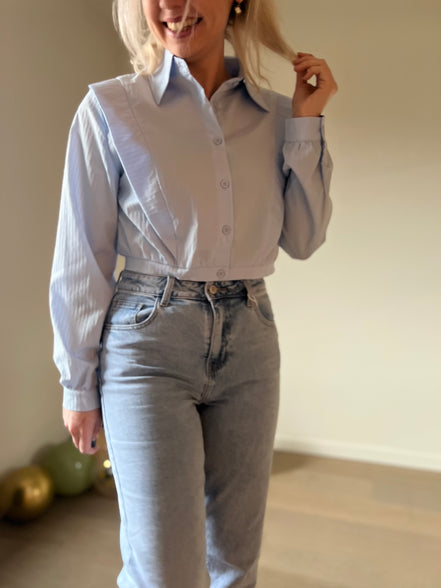 Blue cropped shirt