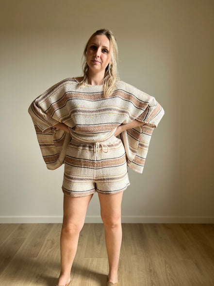 Knitted poncho - cream striped