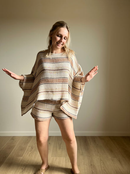 Knitted poncho - cream striped