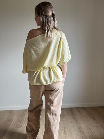 Yellow draped wrap blouse